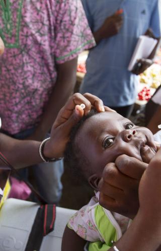 Administering Polio Vaccine Administering Polio Vaccine