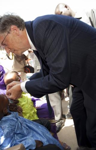 Bill Gates participates during the polio campaign launch ceremony at Liberty Hospital. Bill Gates Administering a Polio Vaccine